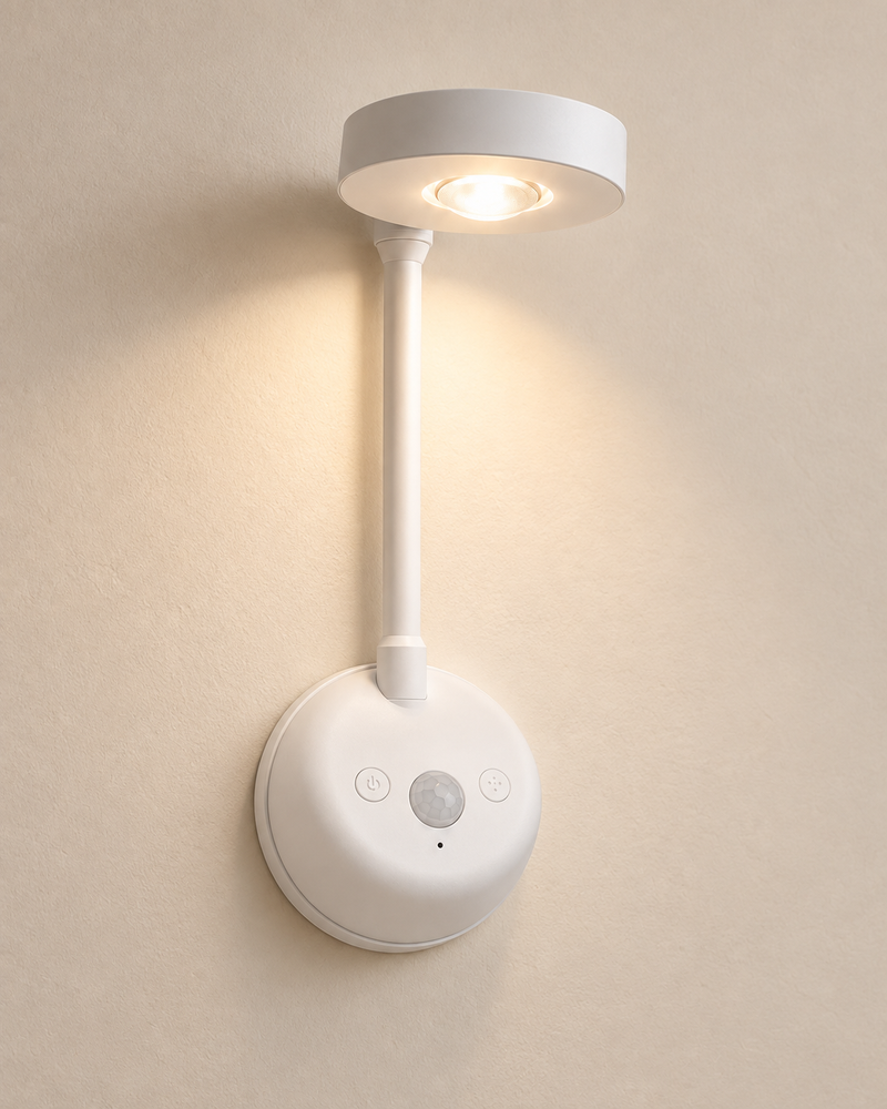 Motion sensor wall light in white, wall mounted and lit